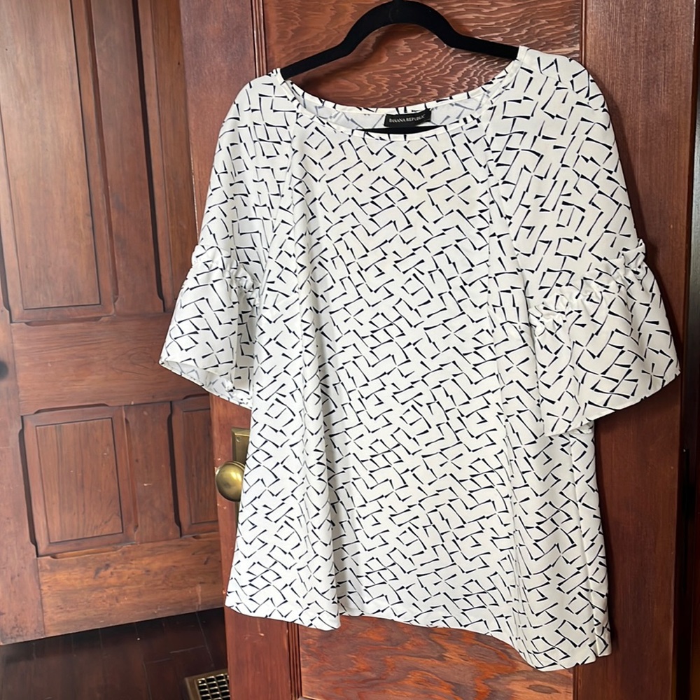 Gently worn large Banana Republic blouse. Small makeup stain.